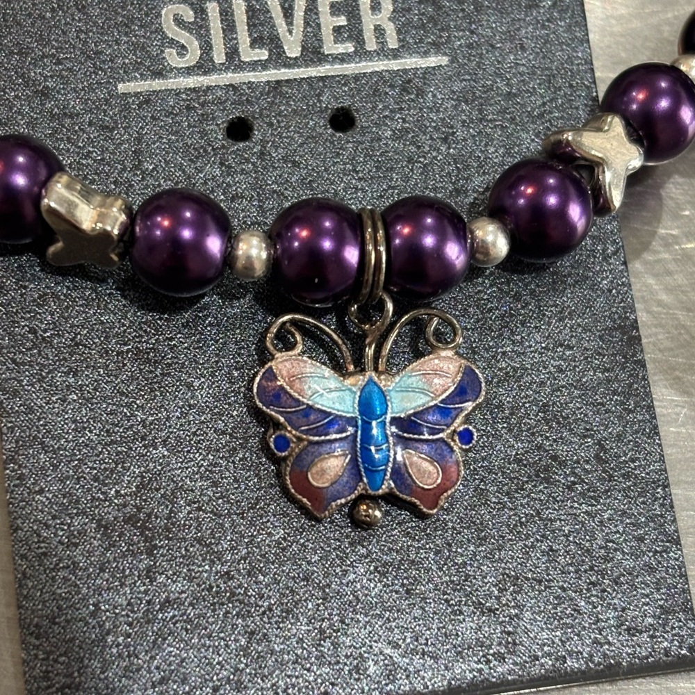 Beaded elastic bracelet with sterling silver butterfly